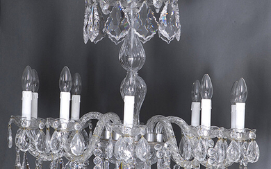 Czech glass lamp with twelve arms of light, Bohemia, 20th century. Decoration of hanging drops, faceted prisms, chains and hanging sphere top. Height: 85 cm approx. Output: 650uros. (108.151 Ptas.)