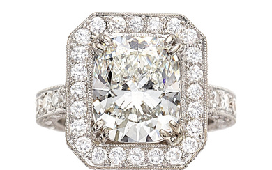 Diamond, White Gold Ring Stones: Cushion-shaped diamond weighing 5.53...