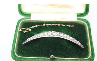 Diamond crescent brooch, set with nineteen old round cut dia...