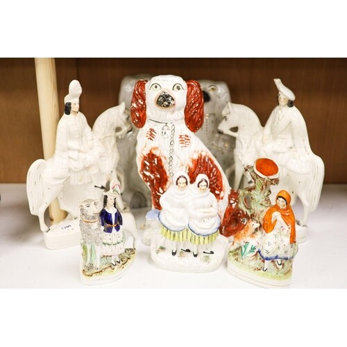 Eight Victorian Staffordshire pottery groups or figures, ...