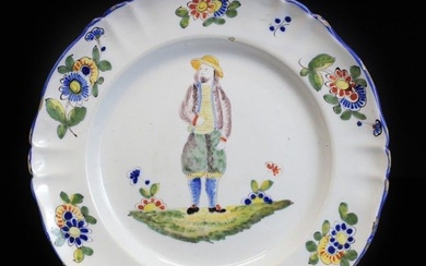 Luneville Faience Earthenware Charger, painted vignette of a standing man