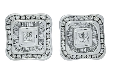 Luxurious 14K white gold earrings set with approximately 1.50ct...