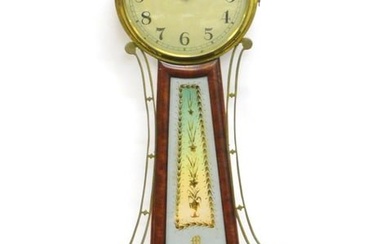 Mahogany weight driven banjo clock. Early 20th c.