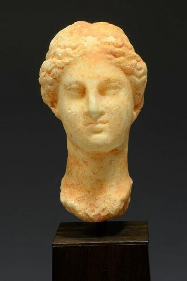 Marble head of a female Goddess, hellenistic, ca. 3rd