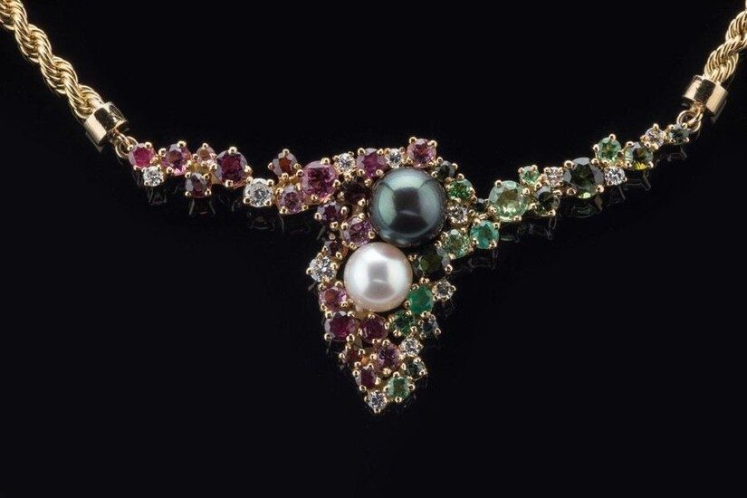 NECKLACE in 750 thousandths yellow gold, string chain, Tahiti cultured pearl and Akoya cultured pearl, adorned with forty-nine diamonds, precious stones and gemstones including: eleven diamonds, seven rubies, seven pink tourmalines, six red garnets...