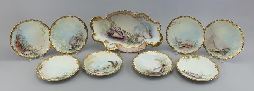 NINE PIECES OF FRENCH SHELL-DECORATED PORCELAIN Late 19th Century