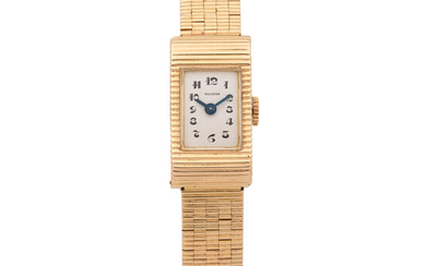 Omega for Boucheron. A lady's 18K gold manual wind bracelet watch London Import mark for 1952