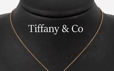 Or 18 cts TIFFANY & CO Pendentif diamant sur chaîne, GG 750/000, de la série...
