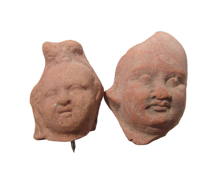 Pair of Romano-Egyptian terracotta Harpokrates heads