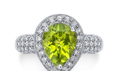 Peridot And Diamond Pear Shape Halo Ring In 18k White Gold