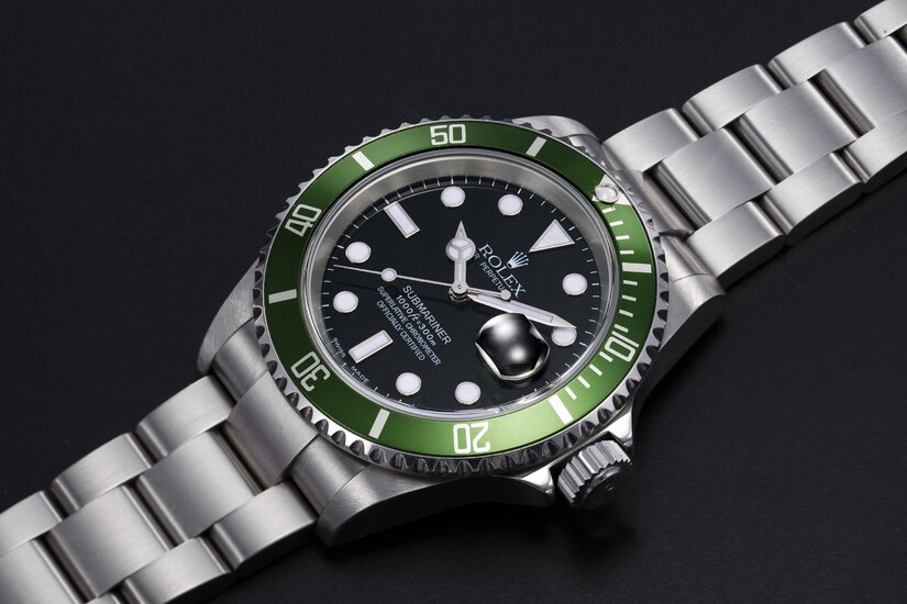 ROLEX, A STAINLESS STEEL OYSTER PERPETUAL SUBMARINER “FLAT FOUR”, REF. 16610LV