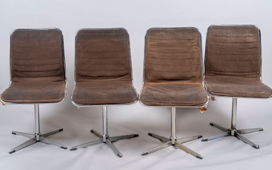 Roche Bobois, suite de 4 chaises à fond de tissu marron, l'assise tournante reposant sur...