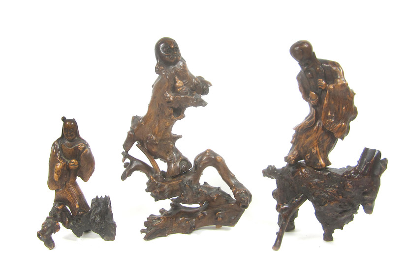 Three rootwood carvings of Daoist Immortals