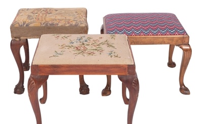 Two carved mahogany and upholstered dressing table stools in...