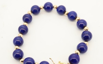 14K gold bracelet with lapis lazulis <br>Set with: <br> <br>14...