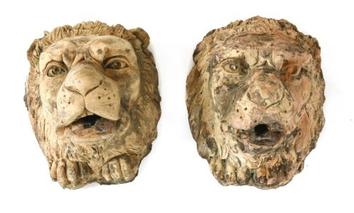 A PAIR OF TERRACOTTA LION'S HEAD FOUNTAIN HEADS
