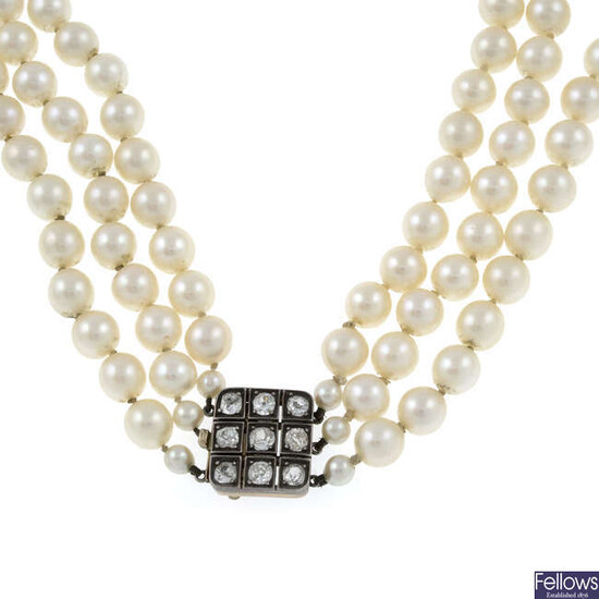 (26911) A cultured pearl three-row necklace, with diamond push-piece clasp.
