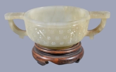 A Chinese small celadon jade two-handled bowl, Qing