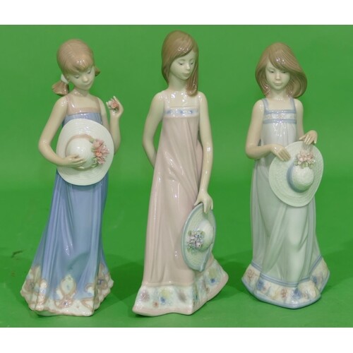 3 x Lladro Figures of young ladies holding hats, tallest 20....