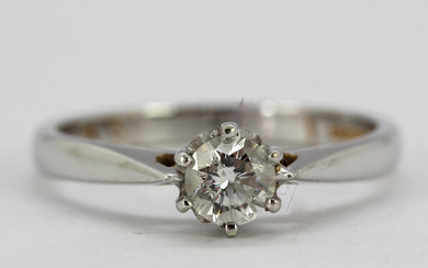 9CT WHITE GOLD AND DIAMOND SOLITAIRE RING.