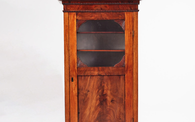 A 19th century Empire display cabinet, veneered in mahogany, interior with shelves.