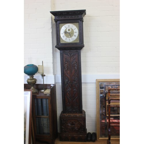 A 19th century carved oak longcase clock, the eight-day move...