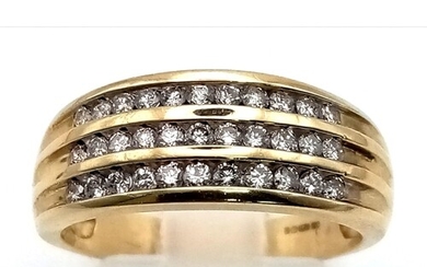 A 9K yellow gold ring with three diamond (0.35 carats) rows ...
