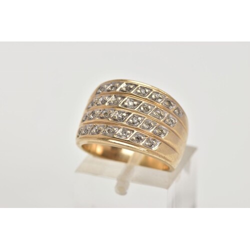 A 9CT GOLD DIAMOND DRESS RING, a wide band designed with fou...