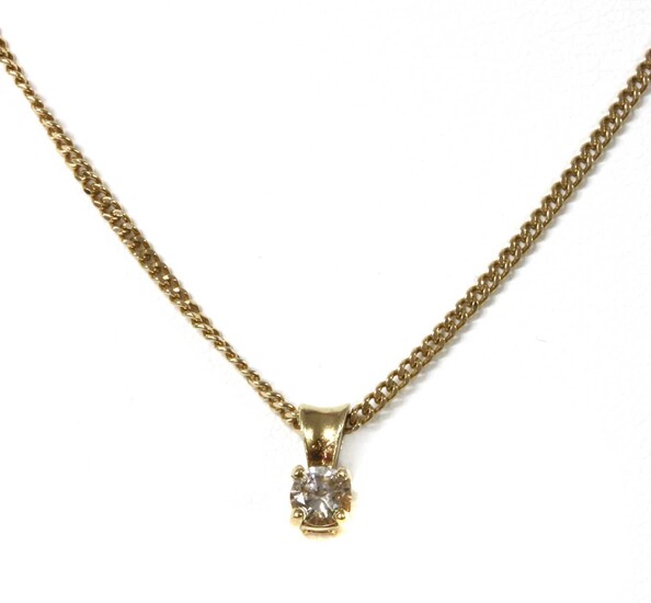 A 9ct gold single stone diamond pendant