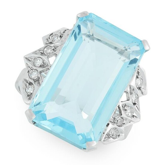 A BLUE TOPAZ AND DIAMOND RING in 18ct white gold, set