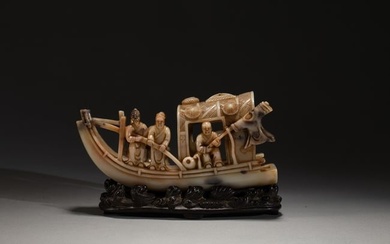 A CARVED SHOUSHAN STONE BOAT