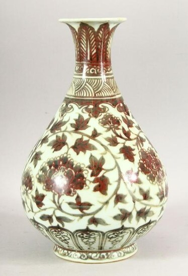A CHINESE IRON RED BULBOUS VASE, decorated with floral