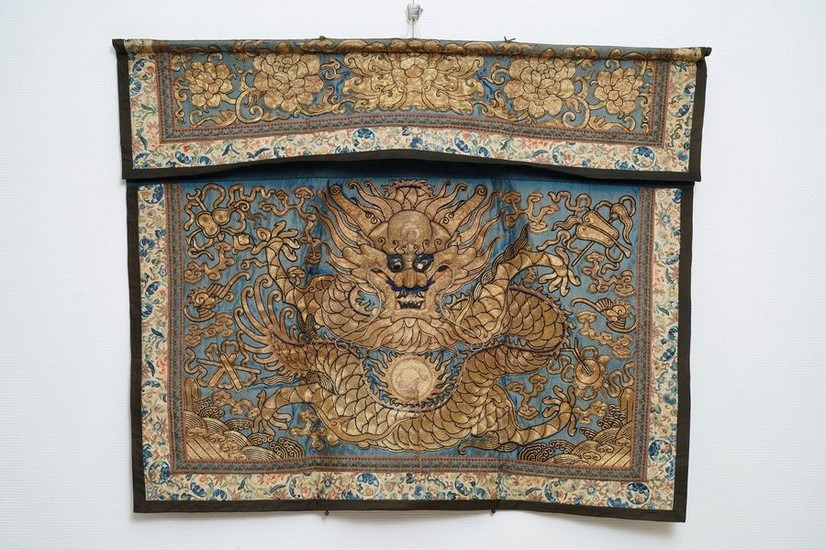 A Chinese gold thread embroidered silk dragon wall...