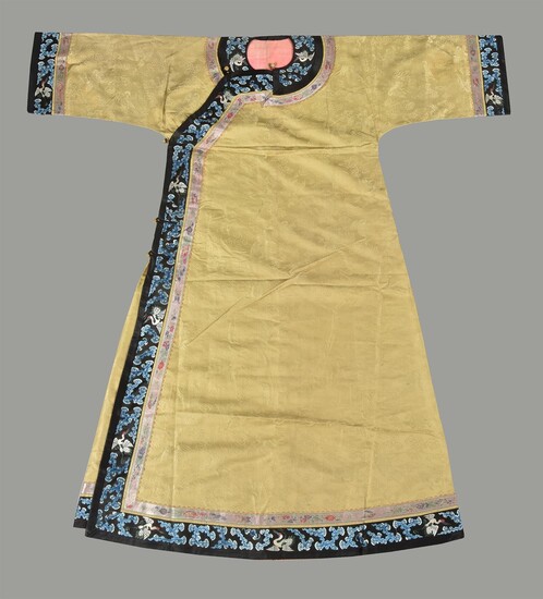 A Chinese lemon yellow silk damask Manchu Court lady's informal robe