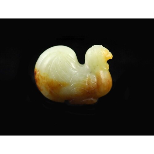 A Chinese pale celadon and russet jade cockerel finial, 3....