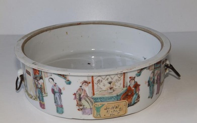 A Chinese shallow cylindrical dish, painted in famille verte...