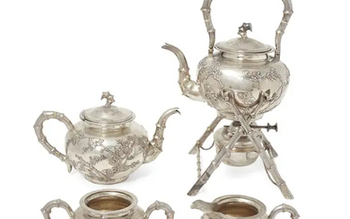 A Chinese silver four-piece 'prunus and bamboo' tea service Retailed by Luenwo,...