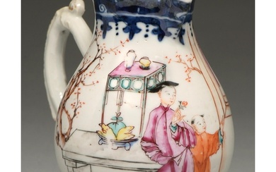 A Chinese underglaze blue and famille rose milk jug, 18th c,...