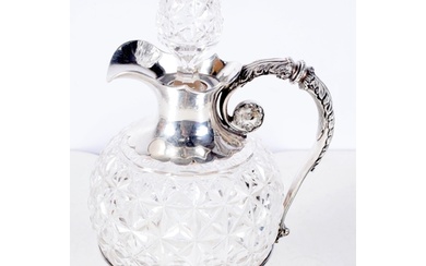 A Cut Glass Claret Jug with Silver Mounts. Possible by Wilk...