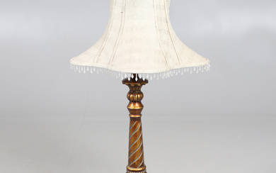A DECORATIVE TABLE LAMP.