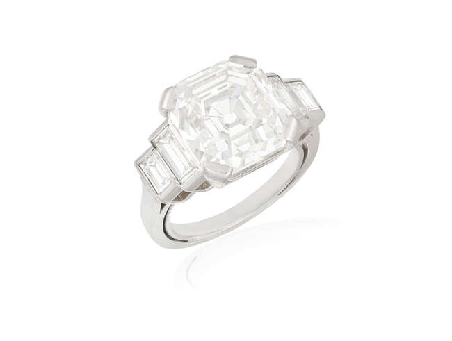 A DIAMOND SINGLE-STONE RING The central asscher-cut diamond...