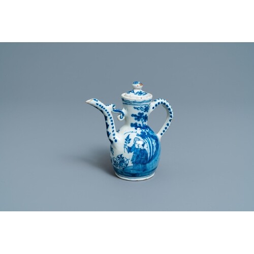 A Dutch Delft blue and white chinoiserie wine ewer and cover...