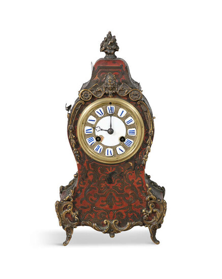 A FRENCH MANTEL CLOCK IN A RED BOULLE...