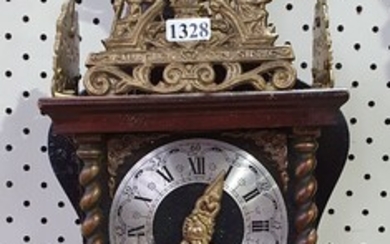 A FRENCH STYLE WALL CLOCK