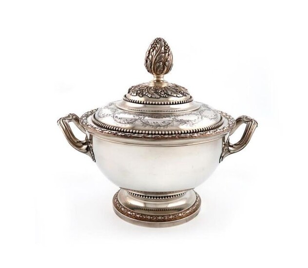A French silver two-handled tureen and cover, by A. Risler and Carre, Paris, circa 1900-1920, circular form, foliate capped fluted side handles, the pull-off cover with engraved foliate decoration, bead and swag borders and with a large foliate cone...