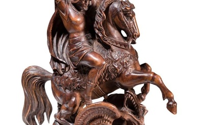 A German carved boxwood figure showing Saint George and the dragon, 19th century