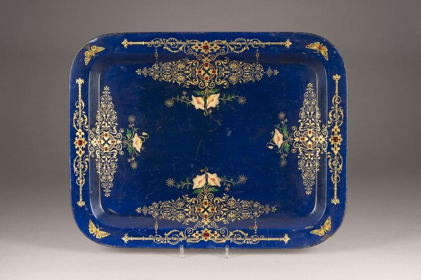 A LARGE METAL AND LACQUER TRAY WITH FLOWERS AND