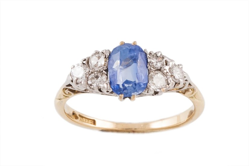 A LATE VICTORIAN SAPPHIRE AND DIAMOND CARVED HEAD RING, with...