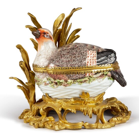 A MEISSEN PORCELAIN PARTRIDGE-FORM TUREEN AND COVER, MOUNTED ON A ROCOCO GILT BRONZE BASE, EARLY 19TH CENTURY