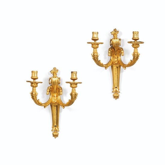 A PAIR OF LOUIS XVI GILT-BRONZE WALL APPLIQUES, CIRCA 1760-1765, ATTRIBUTED TO PHILIPPE CAFFIERI | PAIRE D'APPLIQUES EN BRONZE DORÉ D'ÉPOQUE LOUIS XVI, VERS 1760-1765, ATTRIBUÉE À PHILIPPE CAFFIERI